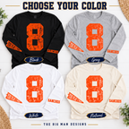 Personalized orange number and sleeve-print design on Black, Gray, White and Natural long-sleeve shirts, showing the four available colors.