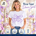 Woman wearing Star Steppers Eleanor heart charms dance tee in a ballet studio