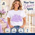 Woman wearing lavender Star Steppers Dance script front-print tee in a ballet studio