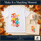 Thankful colorful letters Thanksgiving design. White T-shirt, mug and tote with coordinating artwork, accessories sold separately by request. The Big Man Designs.