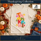 Colorful Thankful Thanksgiving Shirt & Sweatshirt on a Natural T-shirt, autumn boutique styling with The Big Man Designs branding
