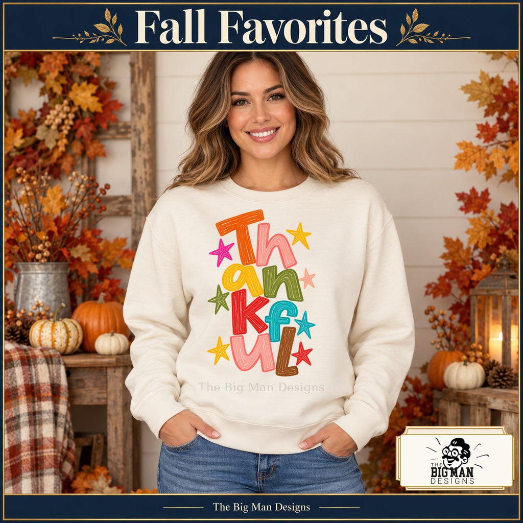 Thankful colorful letters Thanksgiving design. Woman wearing the design on a Natural crewneck sweatshirt. The Big Man Designs.