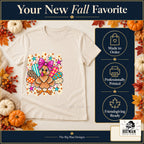 Cute Turkey Pink Bow Thanksgiving design. Natural T-shirt with made-to-order and professional-printing benefit badges. The Big Man Designs.