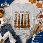 115 A Girl’s Gotta Have Options Halloween Shirt | Spooky Character Graphic Tee