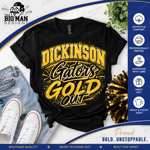A black graphic T-shirt laid flat with distressed blue jeans, white sneakers, and a gold-and-black pom-pom accessory around it. The shirt has a large yellow and black 'DICKINSON Gators GOLD OUT' design.