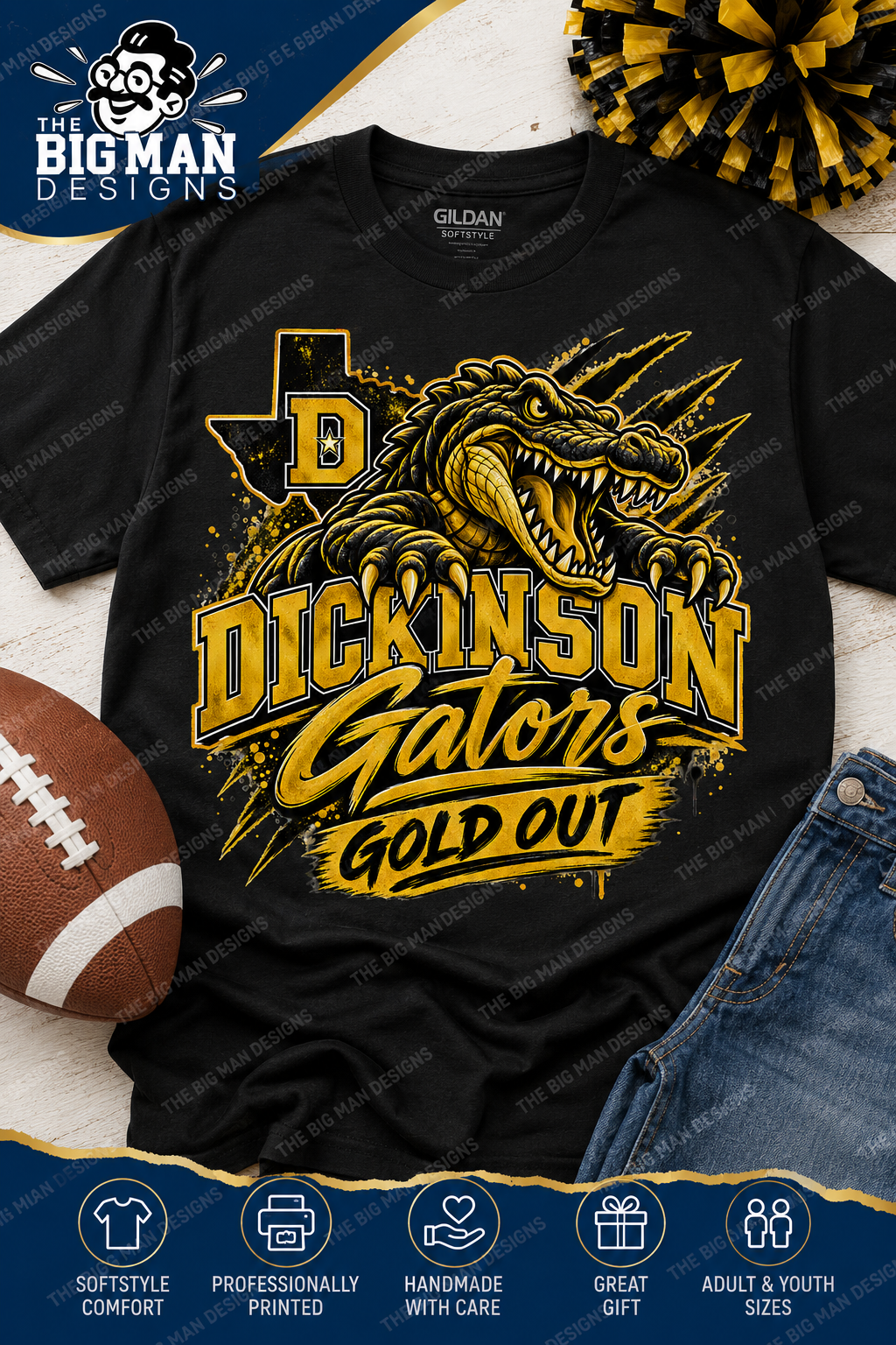 A black short-sleeve graphic T-shirt laid flat with a football, jeans, and a pom-pom around it. The shirt features a large gold and yellow alligator design with the text 'DICKINSON GATORS GOLD OUT' and a Texas-shaped letter D.