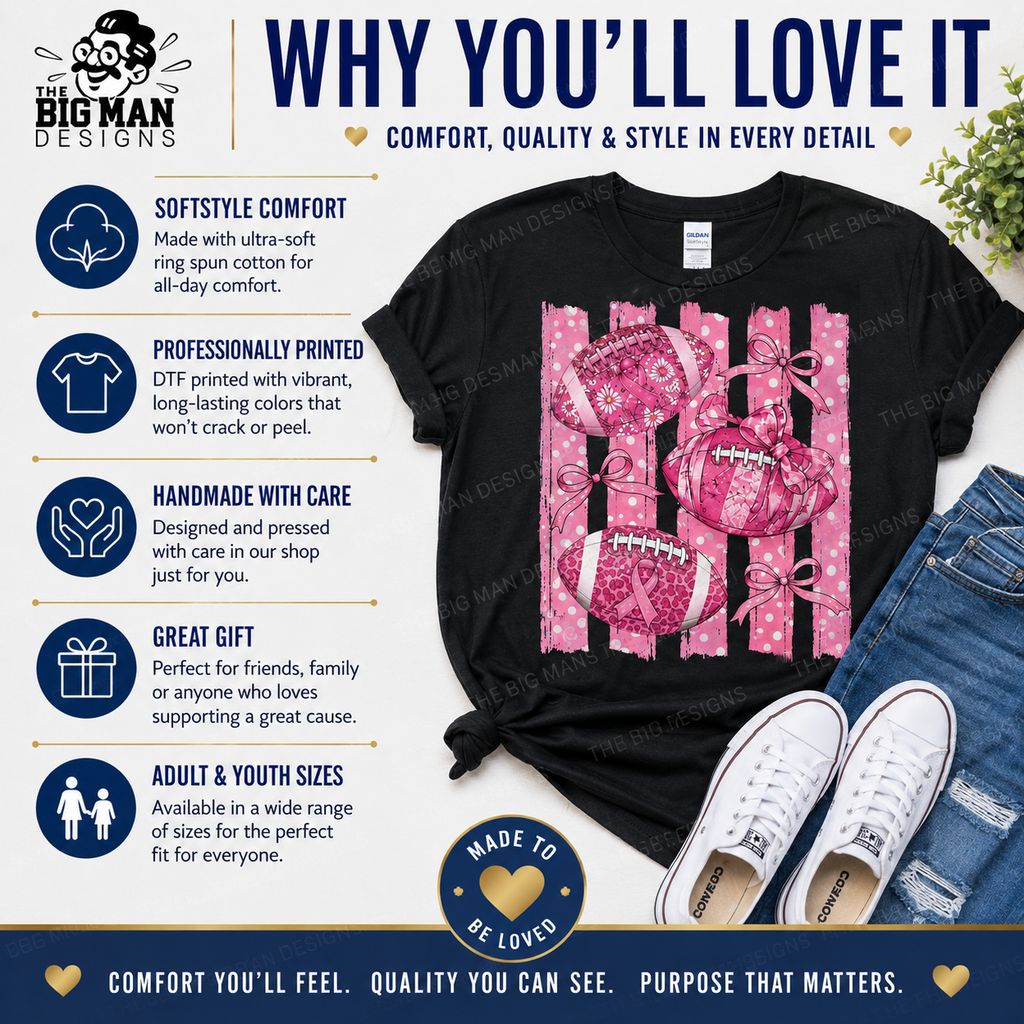 A black short-sleeve graphic T-shirt laid flat with jeans and white sneakers around it on a branded promotional background. The shirt has a pink-and-white striped design with a large pink bow and football motif.