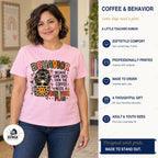 Woman wearing a light pink Even the Coffee Needs a Behavior Plan shirt beside product benefits and The Big Man Designs branding.