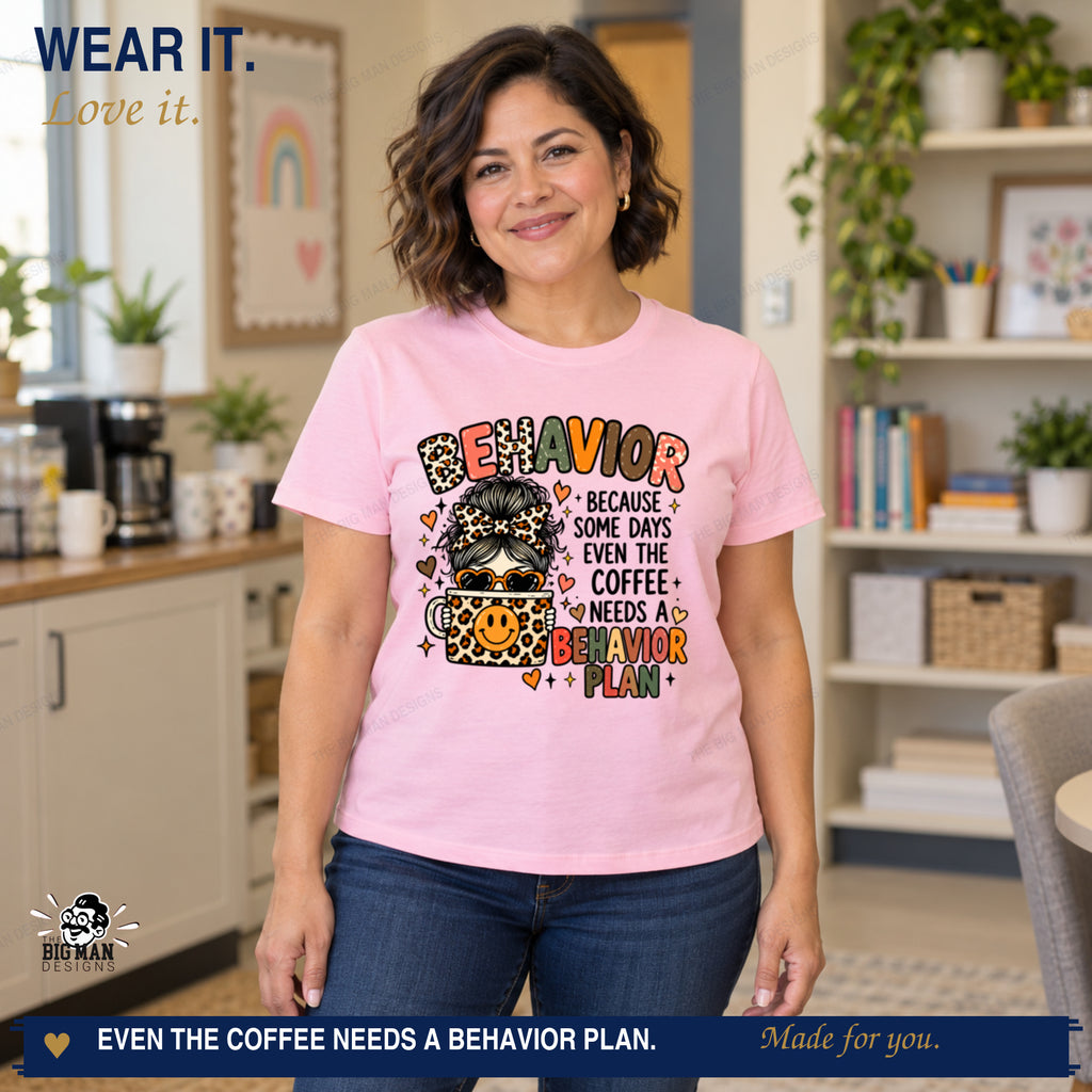 New brunette model wearing the behavior plan coffee shirt with the print centered entirely on the shirt front.