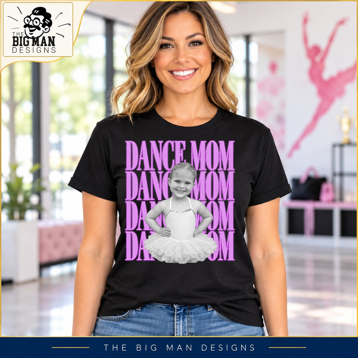 Mother wearing a black Dance Mom photo shirt in a dance studio lobby