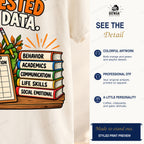 Cropped detail preview of the original data collection gator shirt artwork and colorful books on fabric.