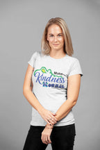 Model wearing the Dickinson Gators kindness shirt in heather gray, styled for casual wear