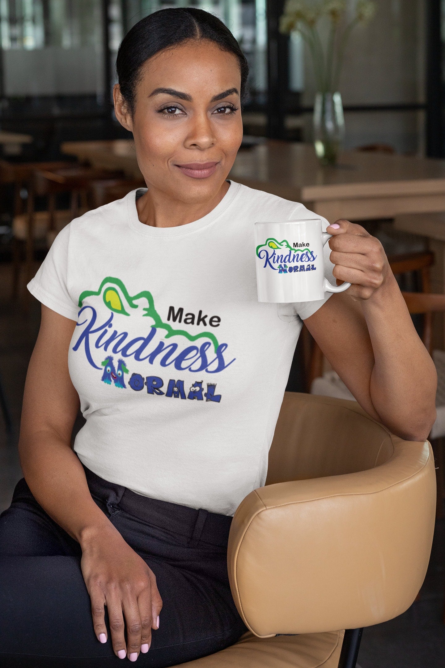Model wearing the Dickinson Gators kindness shirt in heather white, styled for casual wear