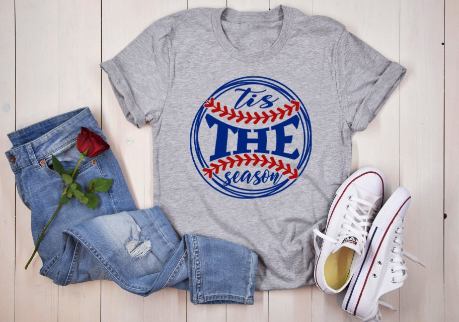 Tis the Season Baseball Tee – DTF Printed Baseball Mom & Grandma Shirt | Grey, Natural, White (Also in Sweatshirt)
The perfect way for proud baseball moms and grandmas to show their team spirit! This  design is printed using Direct-to-Film (DTF) technology for a vibrant, long-lasting finish on cotton. Enjoy a comfortable unisex fit available as a t-shirt in grey, natural, and white, or opt for sweatshirt option in the same colors. Ideal for game days, makes a thoughtful gift for a baseball fan.