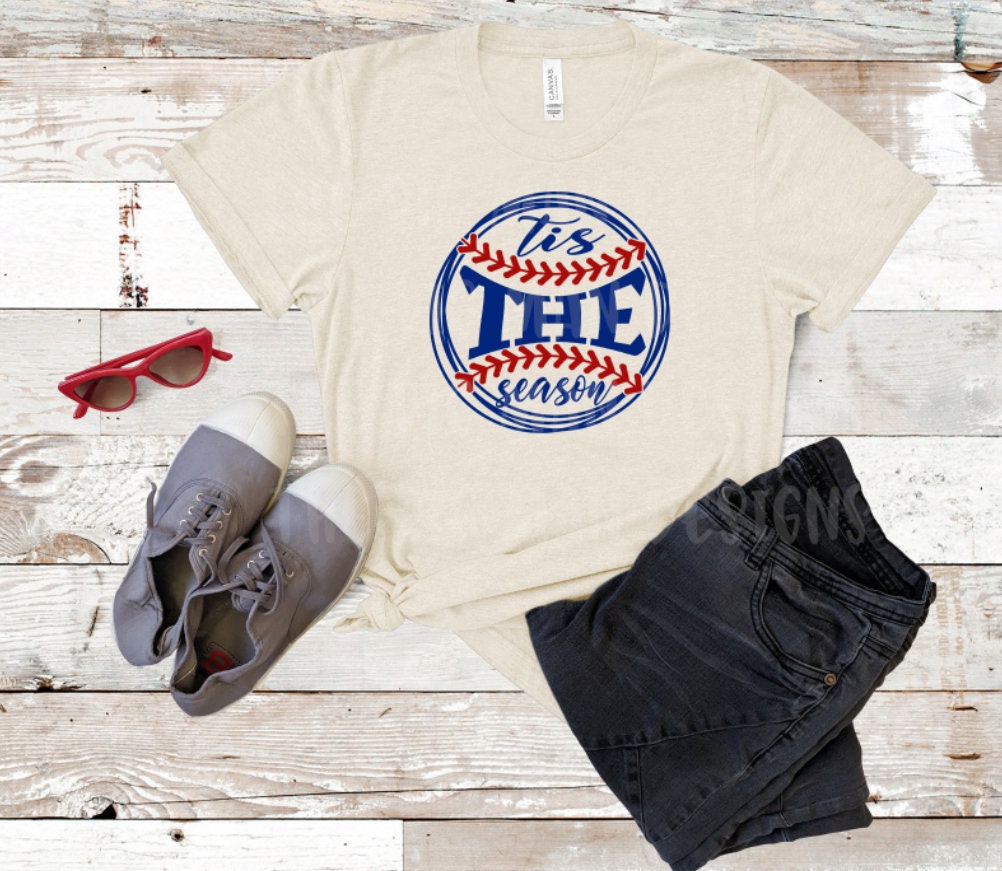 Tis the Season Baseball Tee – DTF Printed Baseball Mom & Grandma Shirt | Grey, Natural, White (Also in Sweatshirt)
The perfect way for proud baseball moms and grandmas to show their team spirit! This  design is printed using Direct-to-Film (DTF) technology for a vibrant, long-lasting finish on cotton. Enjoy a comfortable unisex fit available as a t-shirt in grey, natural, and white, or opt for sweatshirt option in the same colors. Ideal for game days, makes a thoughtful gift for a baseball fan.