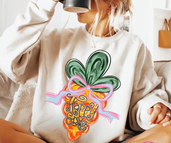 Hop into the Easter spirit with this adorable Coquette Carrot design! Featuring a brushstroke carrot that says Happy Easter with a charming coquette bow, this transfer is the perfect way to add some sweetness and playful charm to your Easter wardrobe. The design captures the joy of Easter with a delicate, whimsical touch, making it ideal for  the holiday. Whether you're crafting a shirt for yourself, a gift, or a special event, this design is sure to bring smiles and lots of Easter cheer!