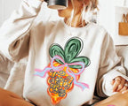 Hop into the Easter spirit with this adorable Coquette Carrot design! Featuring a brushstroke carrot that says Happy Easter with a charming coquette bow, this transfer is the perfect way to add some sweetness and playful charm to your Easter wardrobe. The design captures the joy of Easter with a delicate, whimsical touch, making it ideal for  the holiday. Whether you're crafting a shirt for yourself, a gift, or a special event, this design is sure to bring smiles and lots of Easter cheer!