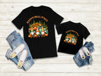 Happy Fall Y'all vibrant Gnomes with pumpkins and sunflowers; shirt is 100% cotton with a DTF design so it will be soft and durable. Great autumn  shirt or a fall gift. Great for going the pumpkin patch or wearing for Thanksgiving. Also available in black.