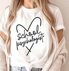 Show off your pride as a Masters Level Certified School Psychologist with this stylish grey t-shirt! Crafted with comfort and durability in mind, this Gildan 100% cotton shirt is perfect for showcasing your professional identity. The licensing board has now allowed masters level school psychologists to officially call themselves School Psychologists, and what better way to celebrate than wearing this unique design featuring the words "School Psychologist" and a heart symbol! on white