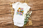 Get ready for Easter with this fun, bright, and colorful "Eggs-Cavator" design! Featuring a playful excavator digging up bright eggs alongside a cute bunny, this DTF transfer is perfect for creating unique Easter-themed shirts. Printed with high-quality Direct-to-Film (DTF) technology, ready to press onto your favorite shirt. Great for Easter gifts, family outings, and more. On a onesie