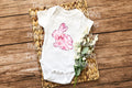Floral pink toile bunny onesie, featuring an elegant vintage design, perfect for Easter.