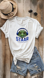 Get ready to rock testing season with this high-quality DTF transfer featuring a gator head wearing headphones and the phrase STAAR Rock Your Accommodations! Perfect for teachers, administrators, and school staff, this ready-to-press transfer makes it easy to create custom shirts for testing season! On white