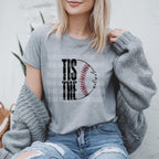 Step up your game day look with this Tis the Season Retro Baseball Game Day DTF Transfer! Featuring a vintage-inspired design, this transfer is perfect for creating trendy baseball shirts, sweatshirts, and more. Just press and go—no weeding required! on grey