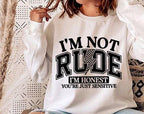 For the bold, the blunt, and the unapologetically honest—this "I'm Not Rude, I'm Honest – You're Just Sensitive" DTF transfer is perfect for those who speak their mind without sugarcoating it! Featuring a trendy, edgy design, this print is great for making a statement at work, with friends, or just in everyday life. close up on white