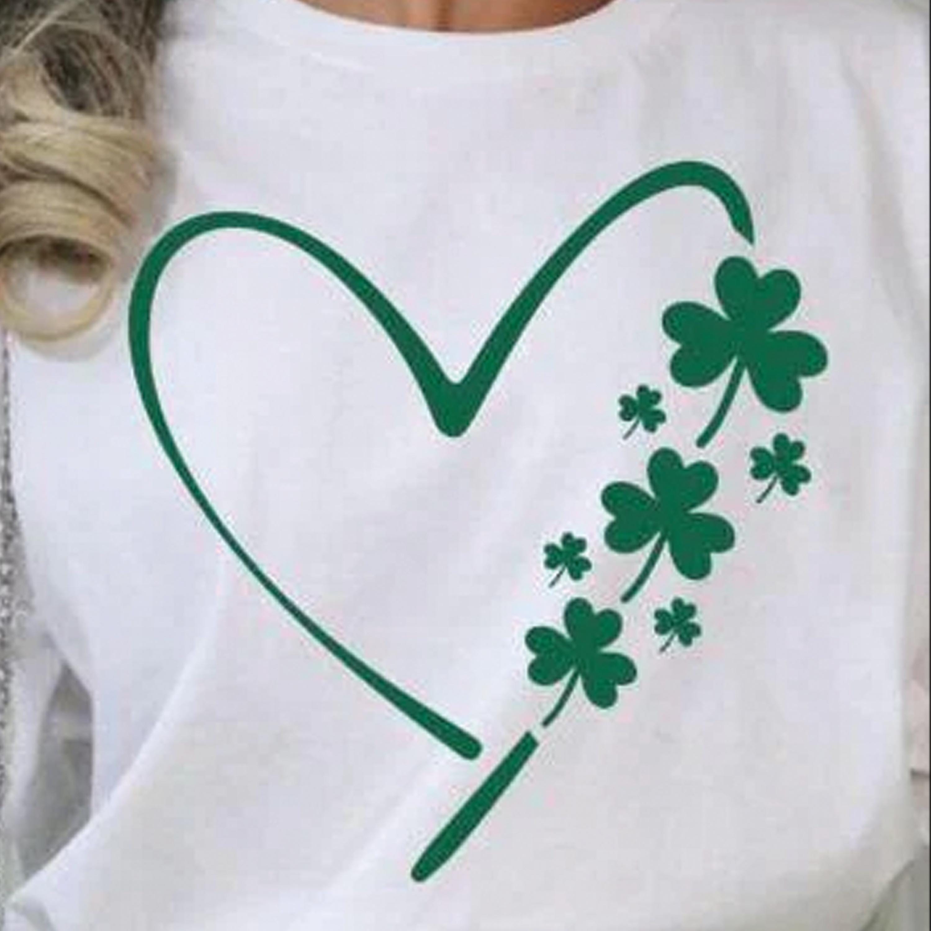 Show off your St. Patrick’s Day spirit with this adorable heart-shaped design, featuring clovers and shamrocks to bring a touch of luck and love to your wardrobe! Available in green or white, this ready-to-press DTF transfer is the perfect way to create festive and stylish t-shirts for the holiday. Whether you’re gearing up for a St. Paddy’s Day party, wearing it to work, or celebrating with friends, this heart with clovers will make your outfit shine. White