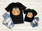 A cozy fall t-shirt featuring a brushstroke pumpkin with a faux glitter effect and a coquette bow. This trendy fall shirt is made from 100% cotton and available in sport grey, natural, black, and white. Perfect for a pumpkin patch outfit, Thanksgiving outfit, or a cute autumn aesthetic. The premium DTF print ensures durability with no cracking or peeling. A must-have for cottagecore and neutral fall fashion lovers! available on grey, black, white, and natural.