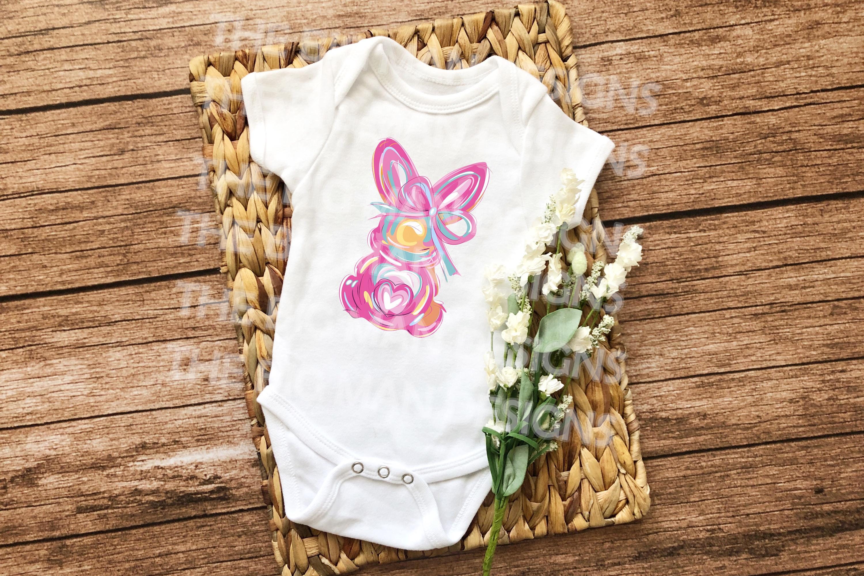 Brushstroke Easter Bunny Coquette Bow DTF Transfer | Ready-to-Press Easter Shirt Print | Pastel Bunny Bow Design. Get ready for Easter in style with this adorable brushstroke bunny DTF transfer featuring a chic coquette bow! This soft pastel design blends trendy brushstroke art with a vintage-inspired feminine touch, making it the perfect choice for Easter outfits, and stylish t-shirts. This ready-to-press Direct to Film (DTF) transfer makes it easy to create your own cute and festive tee!