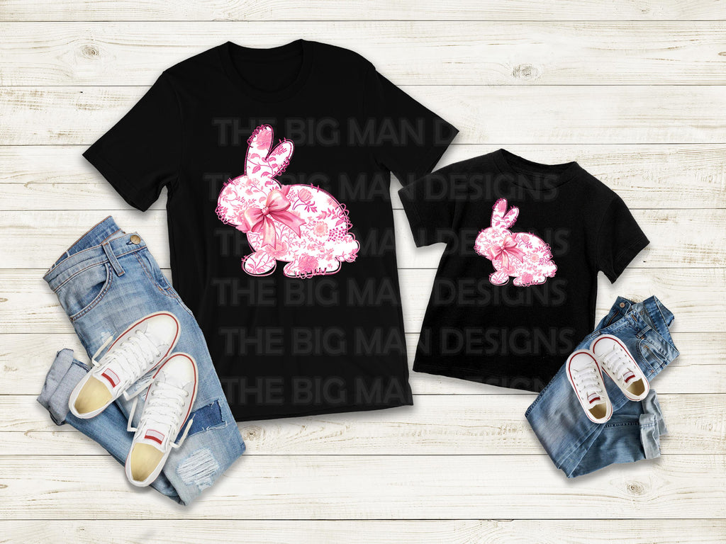 Elevate your Easter and spring wardrobe with this stunning Floral Pink Toile Chinoiserie Full Bunny DTF Transfer! This design features a detailed full-body bunny silhouette, adorned with an elegant pink floral toile pattern, perfect for creating a vintage-inspired, sophisticated look. Whether you’re crafting a stylish Easter shirt, a delicate spring piece, or a timeless fashion statement, this transfer is the perfect addition to your collection. On a black shirt