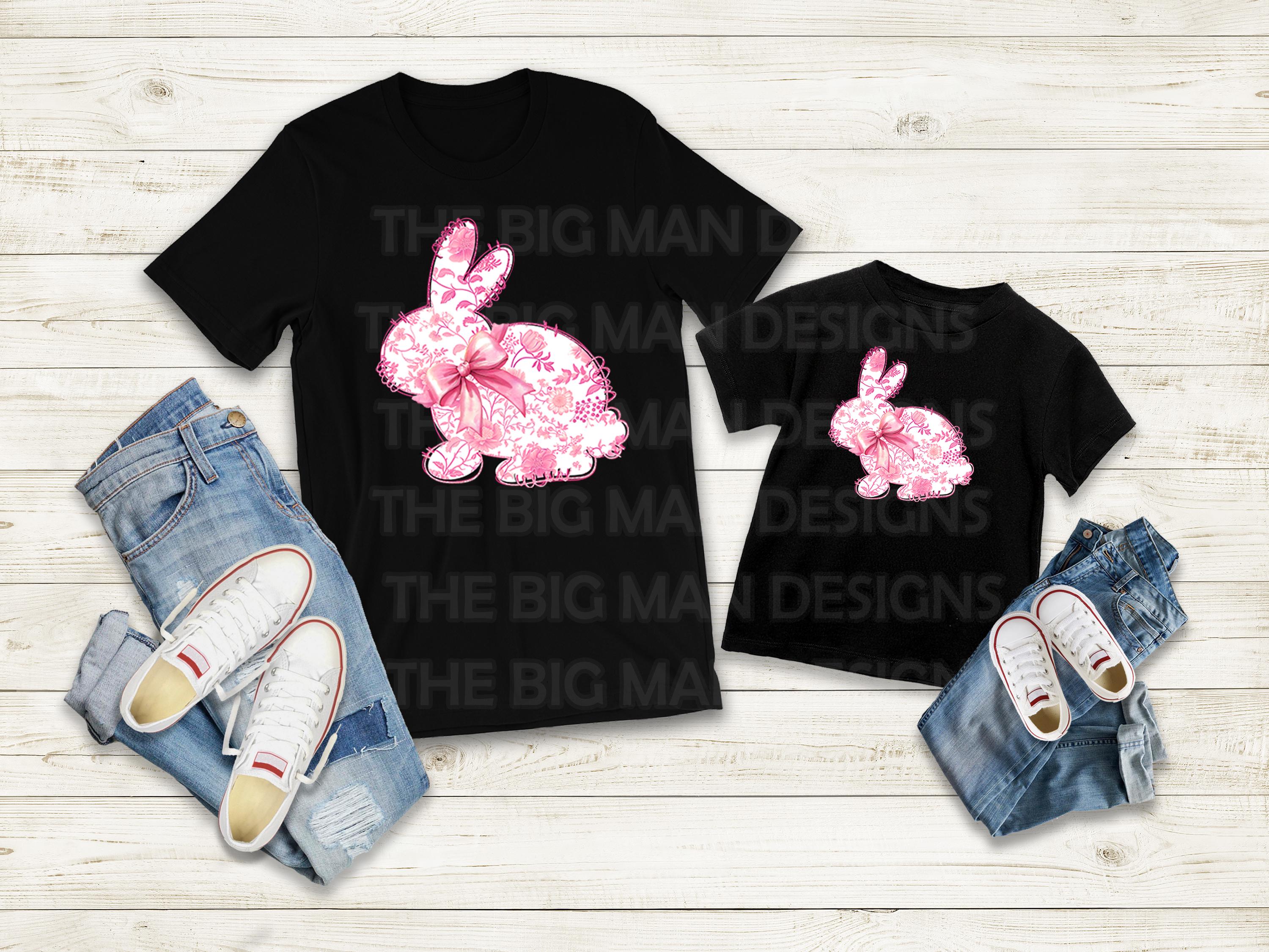 Elevate your Easter and spring wardrobe with this stunning Floral Pink Toile Chinoiserie Full Bunny DTF Transfer! This design features a detailed full-body bunny silhouette, adorned with an elegant pink floral toile pattern, perfect for creating a vintage-inspired, sophisticated look. Whether you’re crafting a stylish Easter shirt, a delicate spring piece, or a timeless fashion statement, this transfer is the perfect addition to your collection. On a black shirt