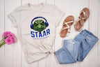 Get ready to rock testing season with this high-quality DTF transfer featuring a gator head wearing headphones and the phrase STAAR Rock Your Accommodations! Perfect for teachers, administrators, and school staff, this ready-to-press transfer makes it easy to create custom shirts for testing season! another view on natural
