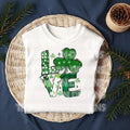 Celebrate St. Patrick’s Day with this adorable "Love" DTF transfer featuring a shamrock as the O in the word “Love”! This festive green design combines the spirit of the holiday with the cuteness of a shamrock, making it perfect for creating lucky St. Patrick's Day outfits. Whether you're heading to a celebration or just want to add a little festive charm to your wardrobe, this ready-to-press DTF transfer is the perfect way to bring some luck and love into your day!