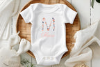 Personalized Floral Initial & Name Baby Bodysuit | Custom Name Onesie | Baby Shower Gift

Celebrate your little one's name with this personalized baby onesie, featuring a beautiful floral initial and a delicate handwritten script name. This custom baby outfit makes the perfect baby shower gift, coming home outfit, or keepsake for a newborn photo shoot.