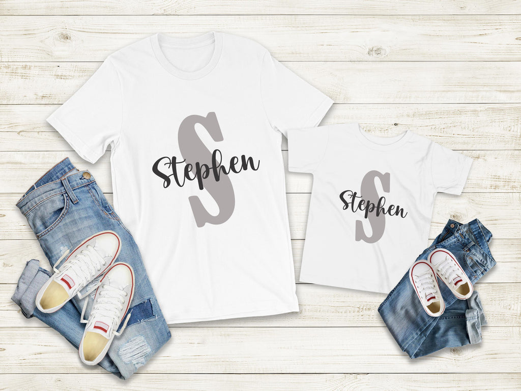 Custom Name Baby Bodysuit | Personalized Baby Boy Outfit | Name Onesie® Toddler & Youth Tee

Make your little one’s outfit extra special with this personalized name onesie featuring a bold capital letter and a stylish script name underneath. This custom baby bodysuit is a thoughtful baby shower gift, newborn coming home outfit, or a unique keepsake for first birthdays and photo shoots. youth and toddler tshirt