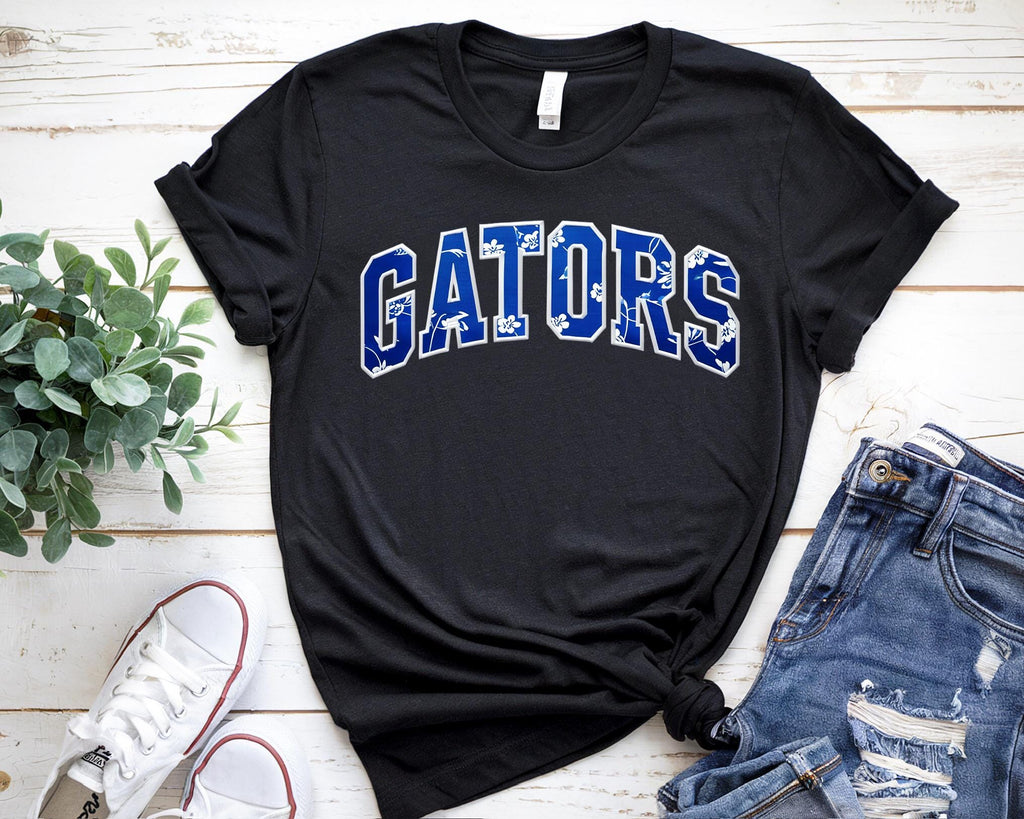 Gators Floral Print T-Shirt & Sweatshirt – Stylish DTF Printed Design
🌸 Show your Gator pride with a stylish floral twist! 🌸

This Gators Floral Print T-Shirt & Sweatshirt is the perfect blend of school spirit and trendy fashion. Featuring the word "Gators" in a beautiful floral print, this design is perfect for game days, casual wear, or as a gift for any proud Gator fan! Made with high-quality DTF printing, this design is vibrant, durable, and long-lasting.