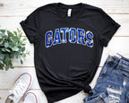 Gators Floral Print T-Shirt & Sweatshirt – Stylish DTF Printed Design
🌸 Show your Gator pride with a stylish floral twist! 🌸

This Gators Floral Print T-Shirt & Sweatshirt is the perfect blend of school spirit and trendy fashion. Featuring the word "Gators" in a beautiful floral print, this design is perfect for game days, casual wear, or as a gift for any proud Gator fan! Made with high-quality DTF printing, this design is vibrant, durable, and long-lasting.
