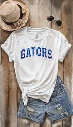 Gators Floral Print T-Shirt & Sweatshirt – Stylish DTF Printed Design
🌸 Show your Gator pride with a stylish floral twist! 🌸

This Gators Floral Print T-Shirt & Sweatshirt is the perfect blend of school spirit and trendy fashion. Featuring the word "Gators" in a beautiful floral print, this design is perfect for game days, casual wear, or as a gift for any proud Gator fan! Made with high-quality DTF printing, this design is vibrant, durable, and long-lasting.