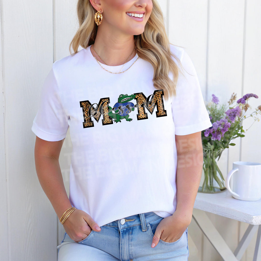 🐊 Celebrate your gator pride with our "Blessed Gator Mom" shirt! Perfect for supporting your favorite team, showing school spirit, or rocking casual mom style with a pop of fun color.