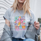 Woman in a sport grey t-shirt featuring "Teaching is a Work of Heart" pencil and flower print.