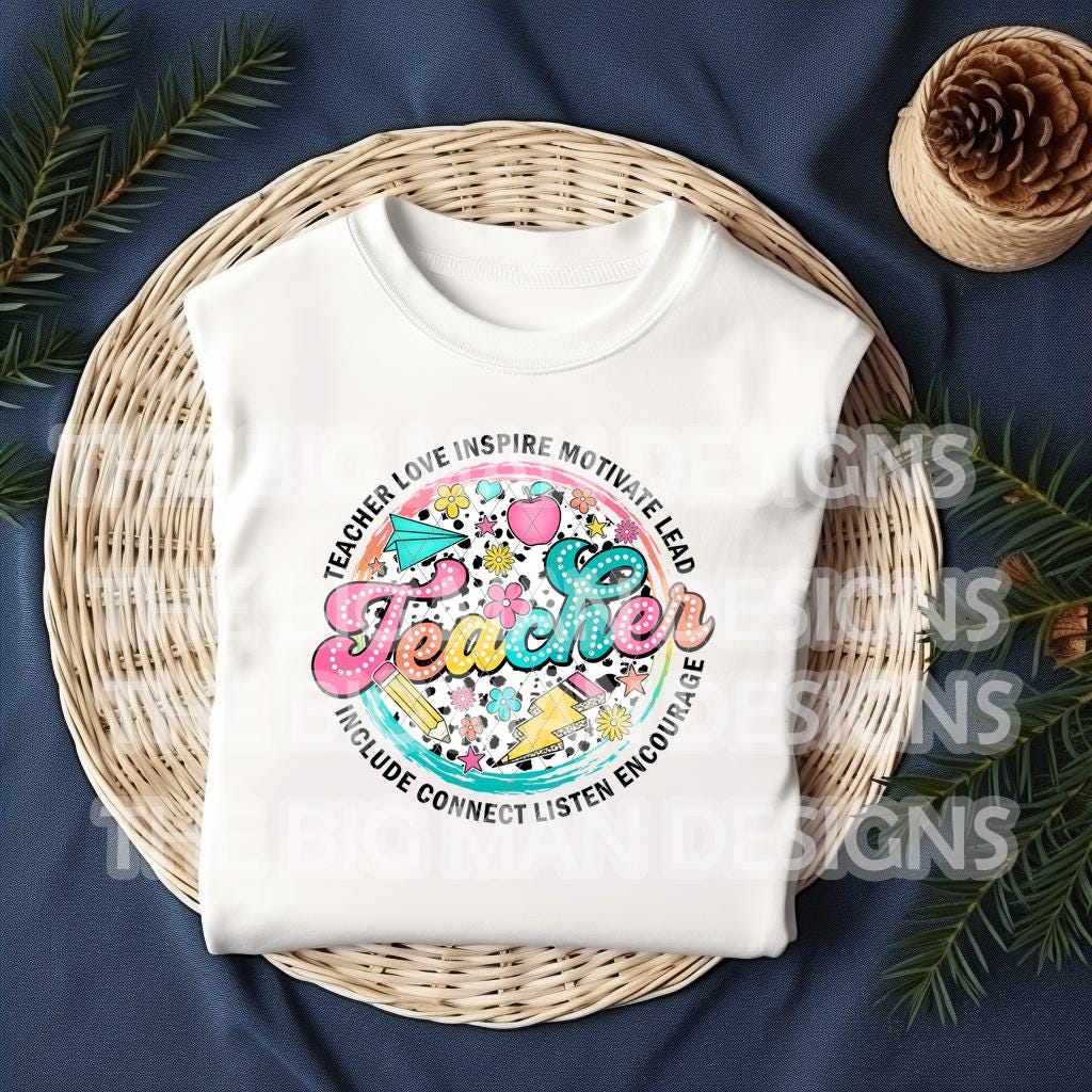 "Colorful teacher love inspire motivate t-shirt folded on basket"