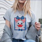 Woman wearing grey t-shirt with American flag goose print