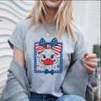 Woman wearing grey t-shirt with American flag goose print
