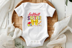 Softball Sister Baby Onesie & Toddler T-Shirt | Cute Softball Fan Outfit | Sports Sister Gift | Baseball Family | Game Day Apparel
Celebrate the littlest softball fan in your family with this adorable "Softball Sister" baby onesie and toddler t-shirt! Perfect for cheering on siblings during games or simply showing off family pride. Featuring vibrant colors, a cheerful softball-themed design with a large yellow bow, bat, helmet, and fun softball graphics, this outfit is sure to be a hom