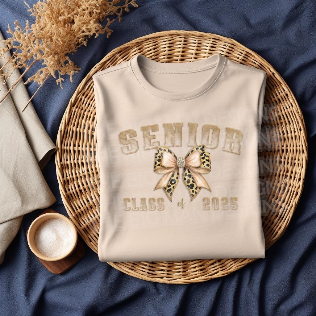 Make a stylish senior statement with this Senior Class of 2025 Leopard Bow DTF Transfer! Featuring a glam varsity font and trendy animal print bow, this ready-to-press transfer is perfect for t-shirts, sweatshirts, and graduation gifts for the girly grad.