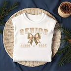 Make a stylish senior statement with this Senior Class of 2025 Leopard Bow DTF Transfer! Featuring a glam varsity font and trendy animal print bow, this ready-to-press transfer is perfect for t-shirts, sweatshirts, and graduation gifts for the girly grad.