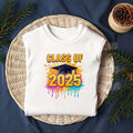 Add some color to your Class of 2025 celebration with this Paint Splash Graduation DTF Transfer! Featuring bold lettering, a graduation cap, and dripping neon paint splashes, this design is perfect for standout senior shirts.