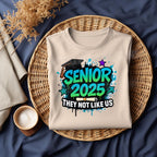 Make a statement with this edgy Senior 2025 – They Not Like Us DTF Transfer! Designed in graffiti-style font with stars, diploma, and graduation cap, this heat transfer is perfect for standout seniors who walk their own path.